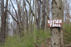 Keyser Trail sign nailed to tree